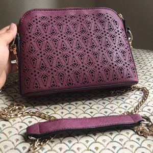 Maroon crossbody clutch with Laser cutouts